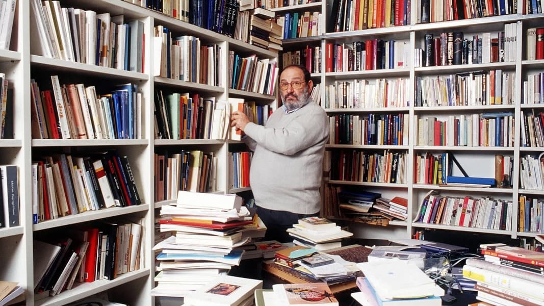 [Umberto Eco is his library]